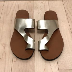 Flat gold sandals